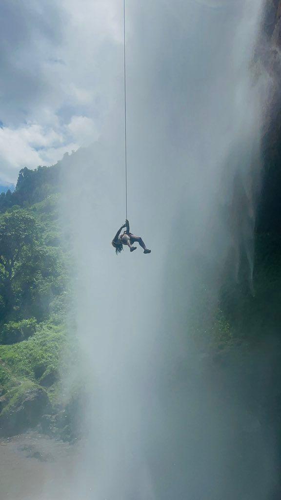 Abseiling next to the falls
